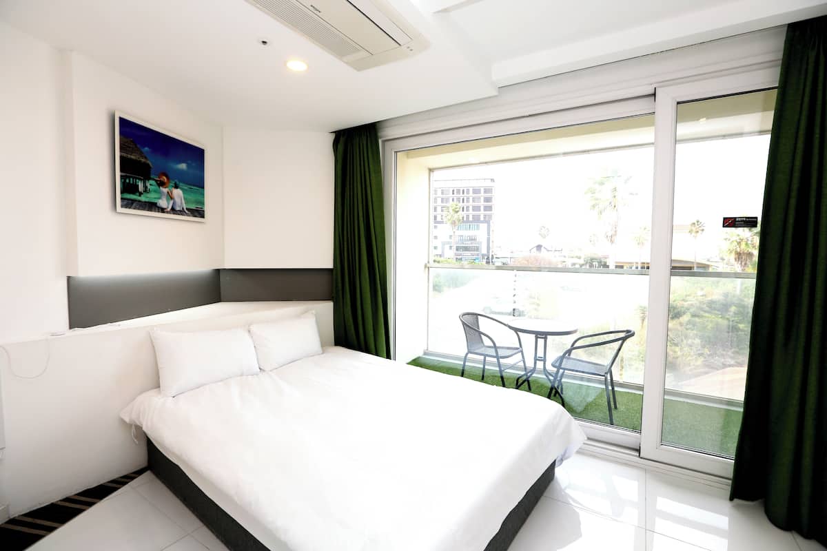 Standaard tweepersoonskamer (For 2 people / 1 Americano per stay) | Kameruitzicht