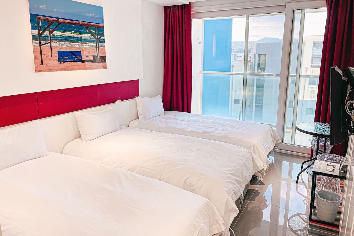 City driepersoonskamer (Provided a cup of Americano per stay) | Gratis wifi, beddengoed