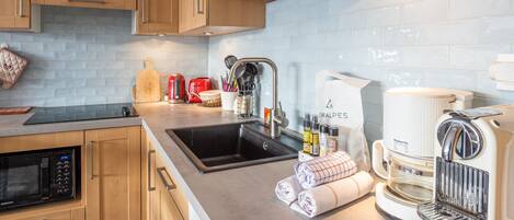 Fridge, microwave, dishwasher, coffee/tea maker