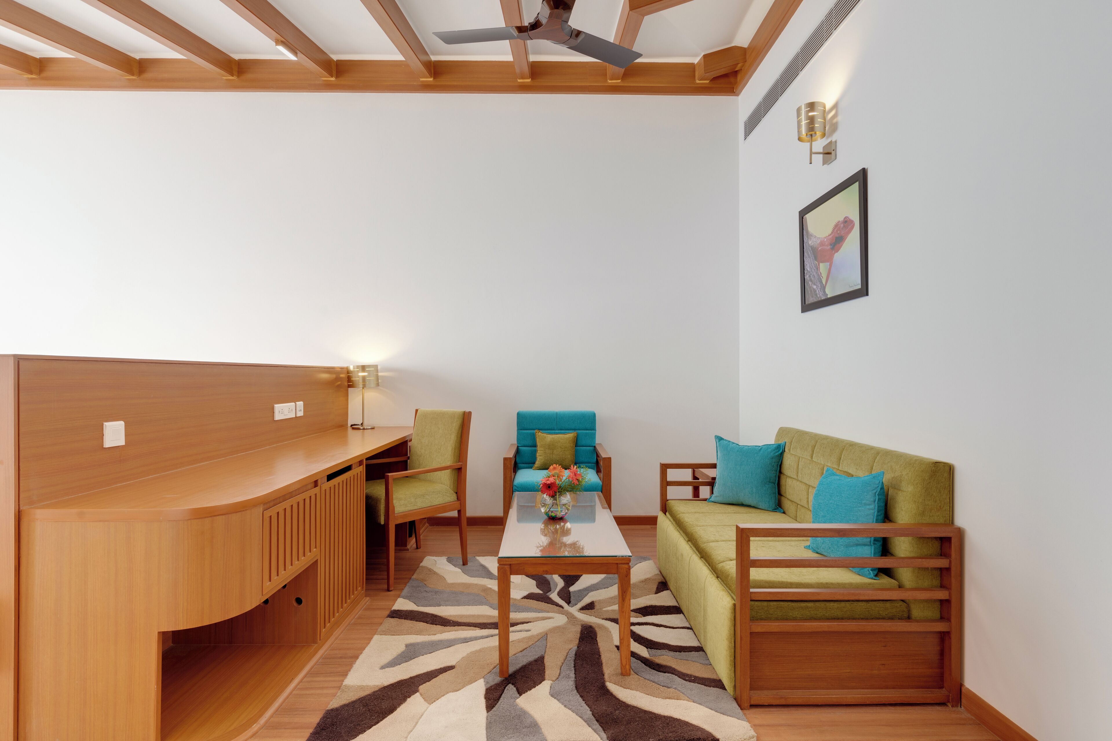 A modern living room with a wooden bench, a sofa, and a coffee table.