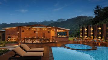 Outdoor pool, open 8:00 AM to 6:00 PM, pool umbrellas, sun loungers