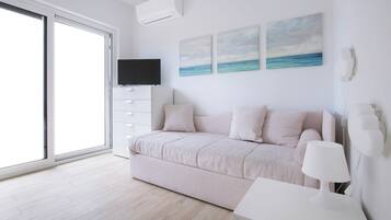 Design Condo, City View | 2 bedrooms, iron/ironing board, free WiFi, bed sheets