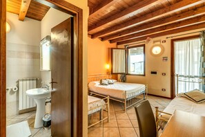 Shower, rainfall showerhead, bidet, towels
