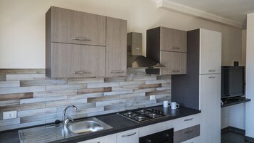 Comfort Apartment | Private kitchen | Fridge, microwave, oven, dishwasher