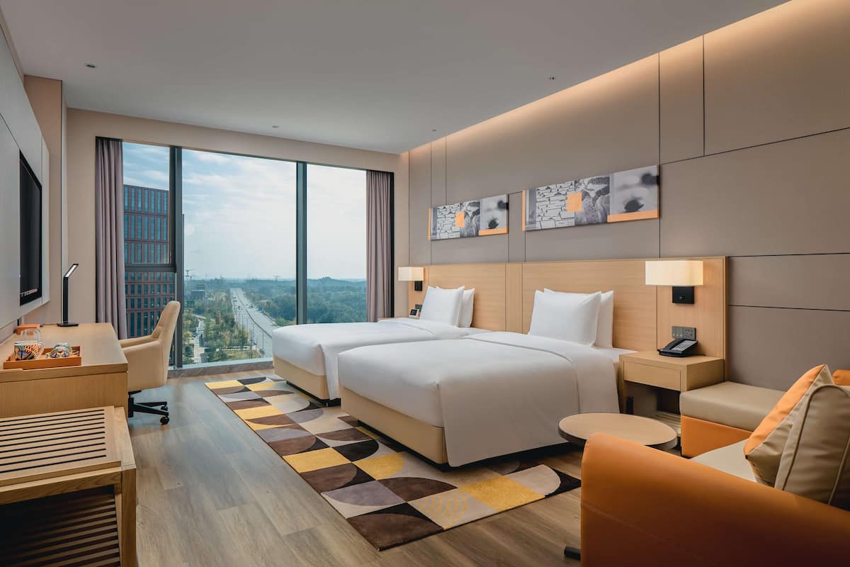 2 twin beds with sofa bed | in-room safe, blackout curtains, iron/ironing board