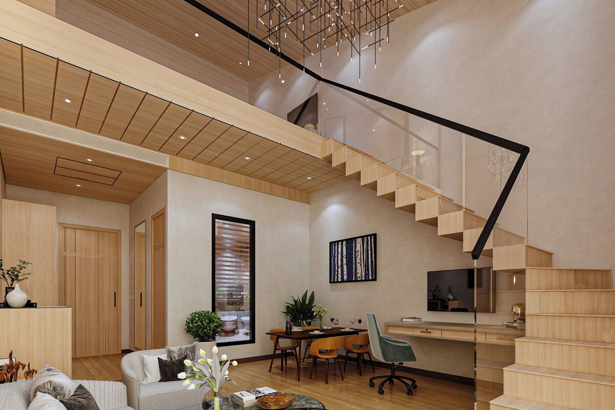A modern living space with a staircase, a dining area, and a seating area with a coffee table.