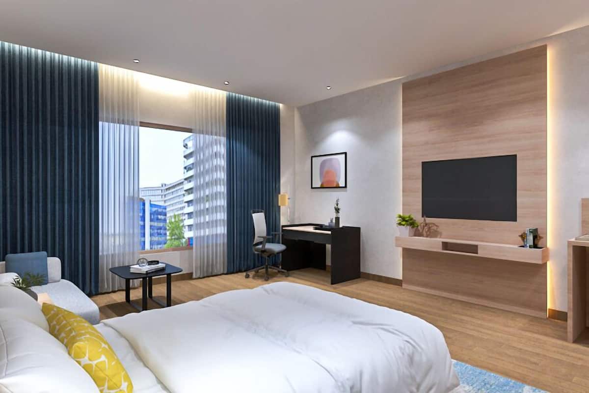 Ropa de cama de alta calidad, minibar y escritorio