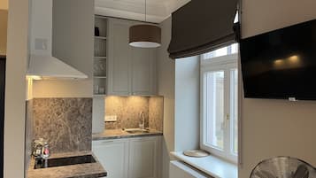 Ropa de cama de alta calidad, minibar y cortinas blackout
