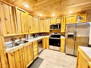 Cottage, 1 chambre | Cuisine privée | Réfrigérateur, four, cafetière/bouilloire, grille-pain
