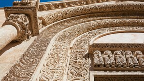A detailed stone carving with floral and animal motifs, part of a larger architectural structure. - Holiday Home 'I Colori di Civico 19' with Terraces & Wi-Fi (Galatina)