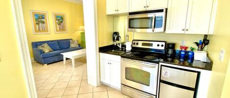 Microwave, coffee/tea maker, cookware/dishes/utensils