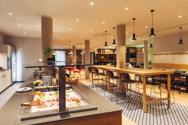 Daily buffet breakfast (EUR 18 per person)