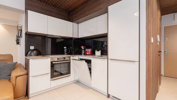 Apartment, 1 Bedroom, Balcony | Private kitchen | Dishwasher, coffee/tea maker, cookware/dishes/utensils