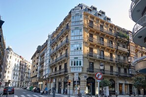 A multi-story building with ornate balconies and a classic architectural style. - Easo Suite 7 by FeelFree Rentals (San Sebastian)