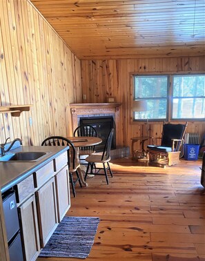 Cedar | Living area | 42-inch flat-screen TV with cable channels, TV - Timber Haven Cabins (Hill City)