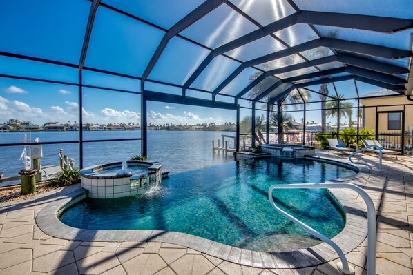 Outdoor pool, a heated pool - Villa Seascape - newly renovated at 8 Lakes, Pool & Spa (Cape Coral)