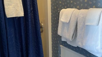 Hair dryer, towels, soap, toilet paper