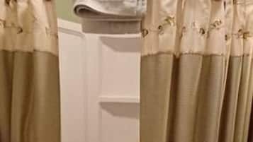 Jetted tub, hair dryer, towels, soap