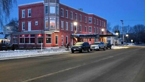 A historic brick building with a tower, a hotel, and a restaurant. - AH #28 · AH #28 King w/Jacuzzi/SS/Fridge/Micro (Wabasha)