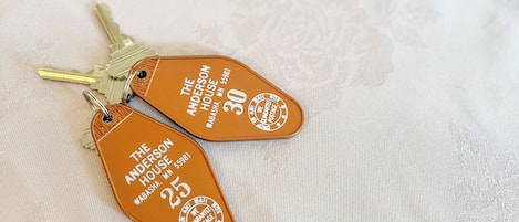 Two key tags with addresses and zip codes for The Anderson House in Wabasha, MN.