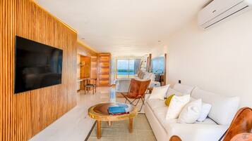 Luxury Villa | Living area | 75-inch Smart TV with digital channels, TV