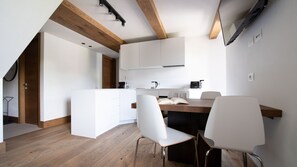 Design Apartment | Living area | 24-inch Smart TV with cable channels, TV