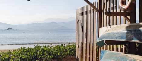 On the beach, free beach cabanas, beach umbrellas