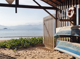 On the beach, free beach cabanas, beach umbrellas