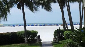 On the beach, sun loungers, beach towels