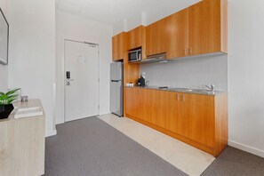 Fridge, microwave, stovetop, coffee/tea maker
