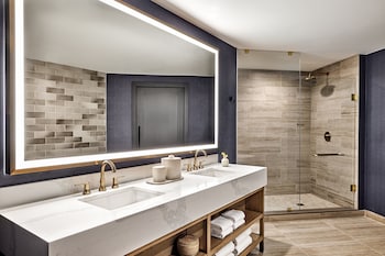 Hair dryer, bathrobes, towels, soap at Omni PGA Frisco Resort & Spa