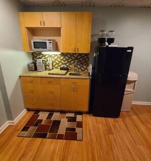 Fridge, microwave, coffee/tea maker, toaster