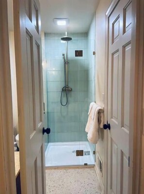 Shower, hair dryer, towels, soap
