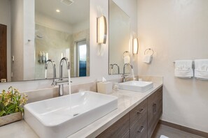 Bathtub, hair dryer, towels, soap