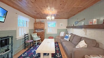 House, Multiple Beds (Dewey Cottage) | Living room | 36-inch TV with cable channels
