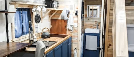 Fridge, microwave, stovetop, coffee/tea maker