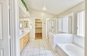 Combined shower/tub, hair dryer, towels, soap