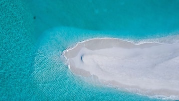 Private beach, white sand, free beach cabanas, sun loungers