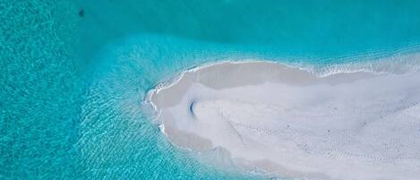 Private beach, white sand, free beach cabanas, sun loungers