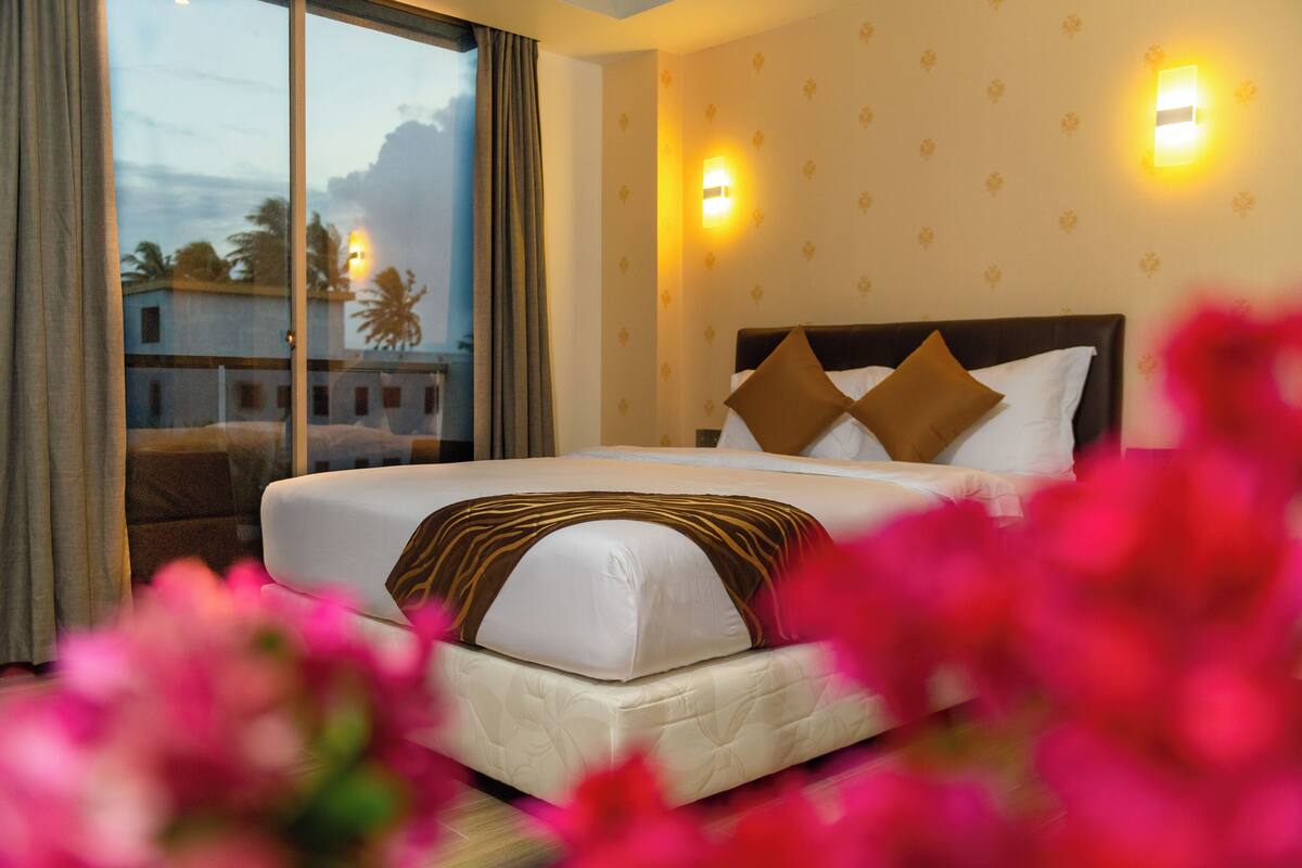 Down comforters, memory foam beds, minibar, in-room safe