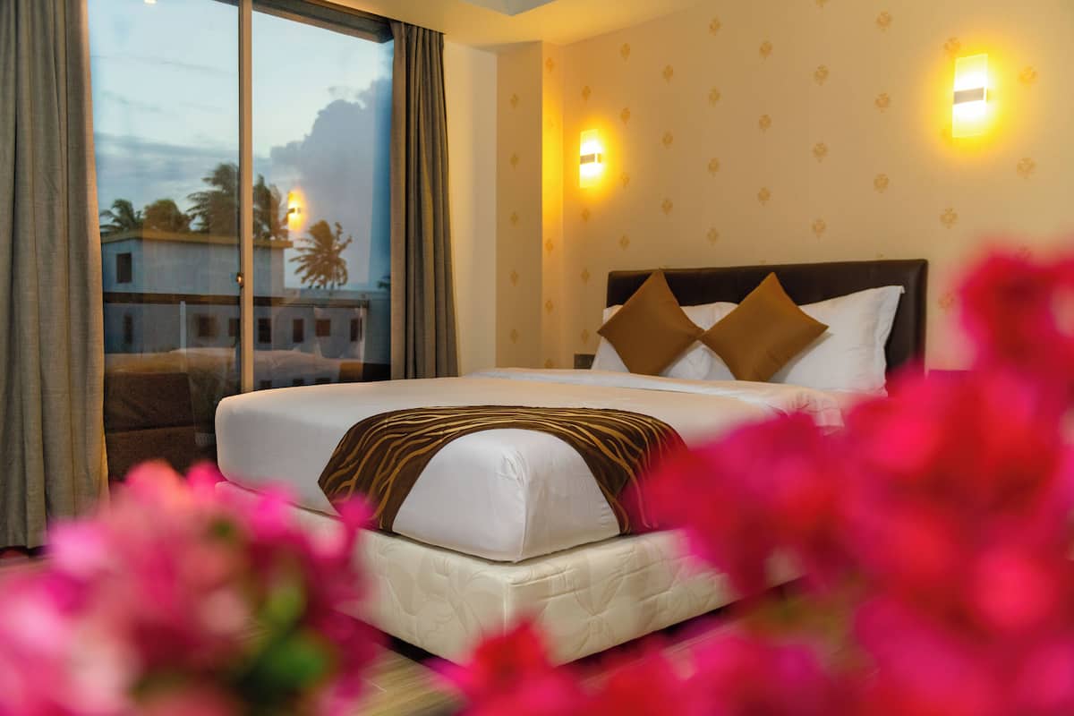 Donsdekens, bedden met traagschuimmatrassen, een minibar