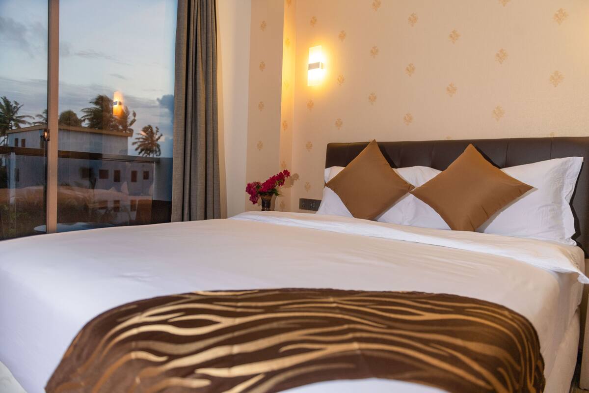 Down comforters, memory foam beds, minibar, in-room safe