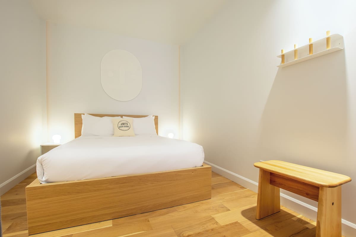 2 bedrooms, blackout curtains, soundproofing, iron/ironing board