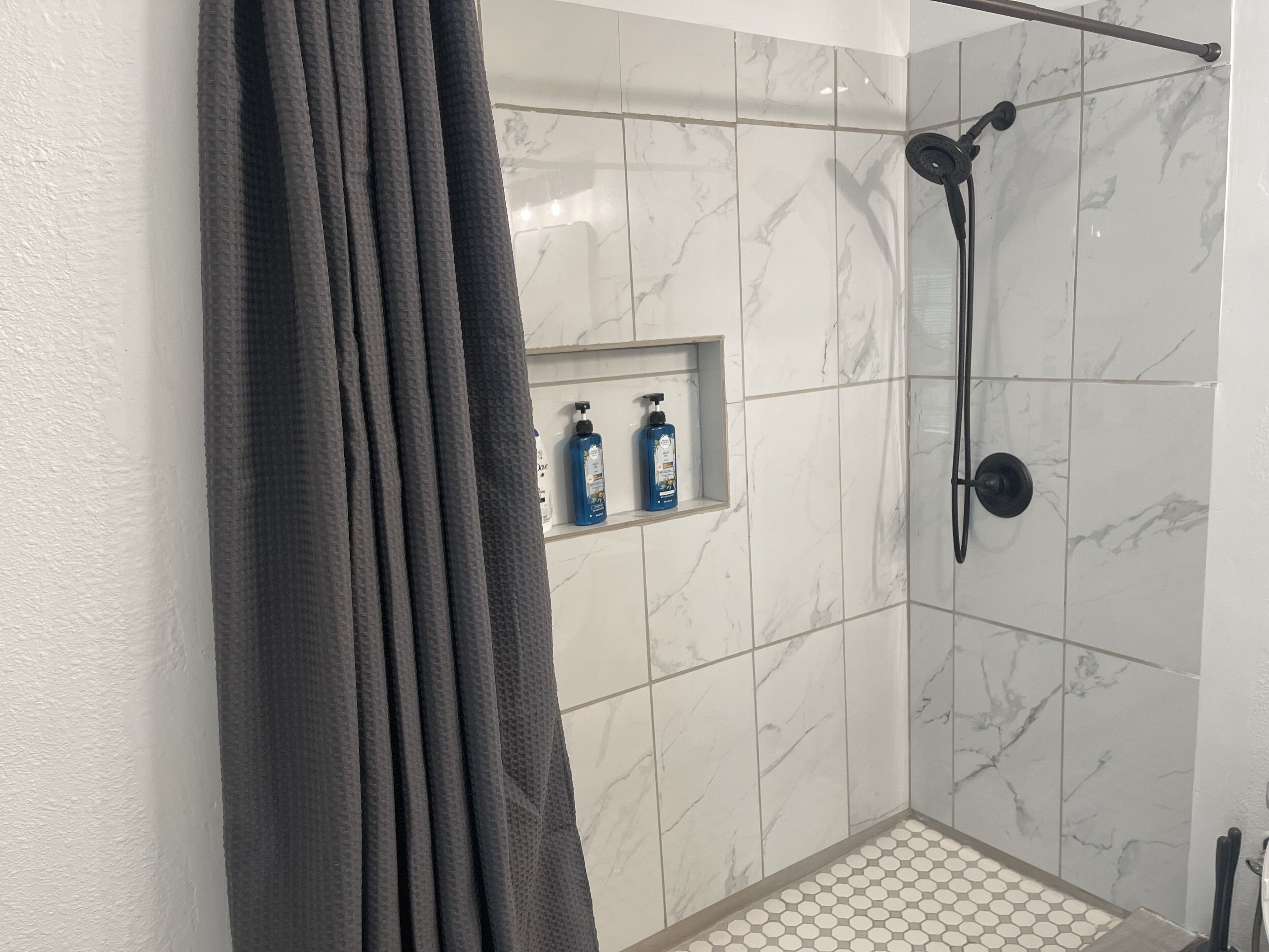 Shower, shampoo, toilet paper