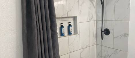 Shower, shampoo, toilet paper