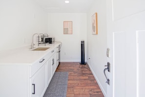 Fridge, microwave, stovetop, coffee/tea maker