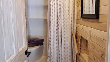 Shower, towels, toilet paper