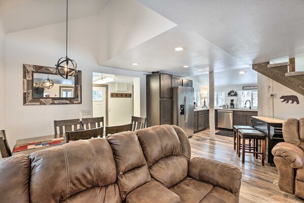 Smart TV, fireplace, books, computer monitors