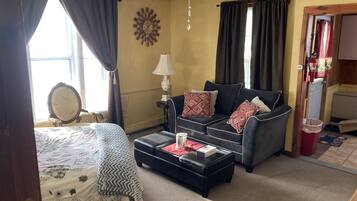 Suite studio classique | Aire de séjour