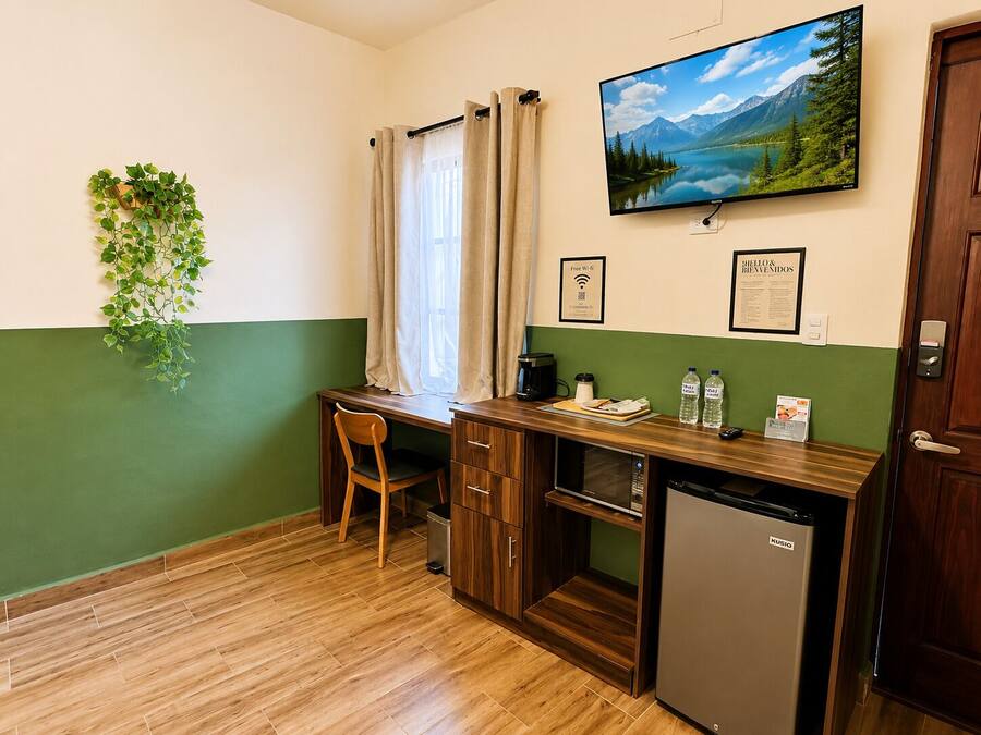 Habitación Confort, varias camas | Zona de estar